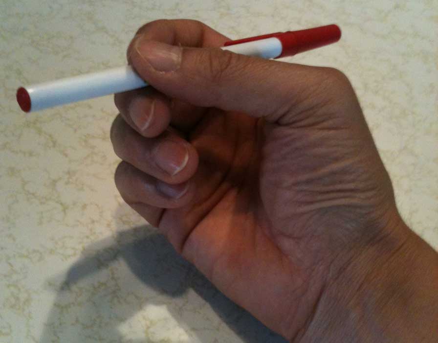 How I hold a pen bottom
